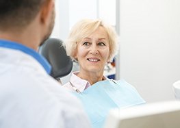 patient smiling at dentist 