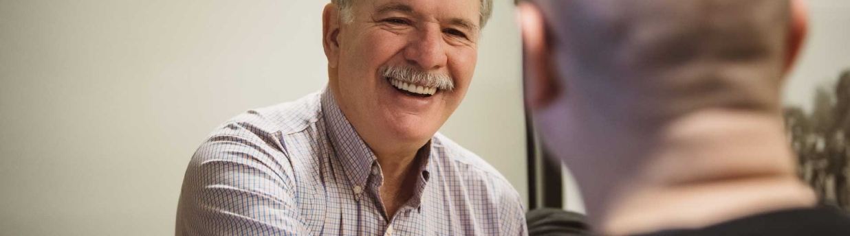 Man smiling at his dentist in Rome Georgia