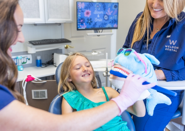 Child getting fluoride treatment