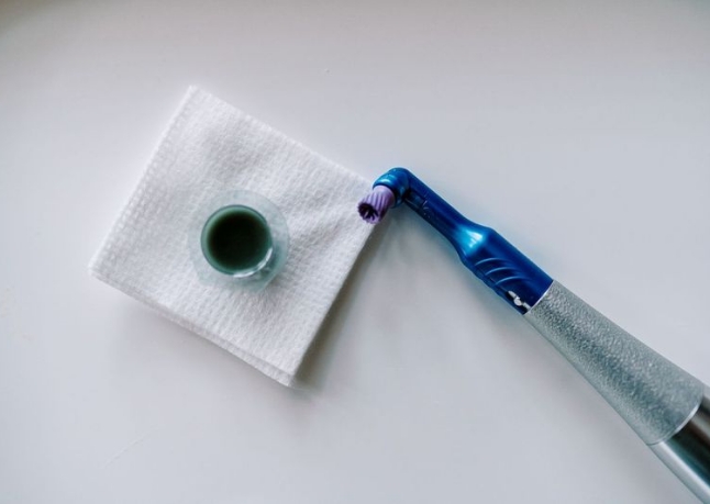 Woman receiving fluoride treatment