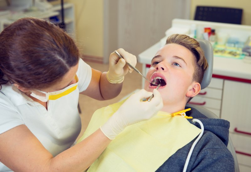 Teen in the dental chair