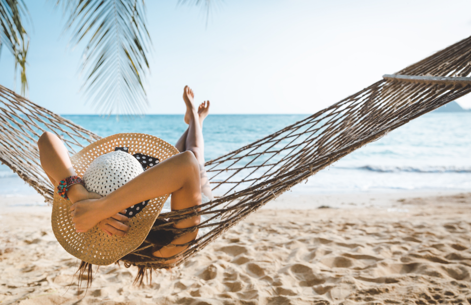 Woman in hammock on beach